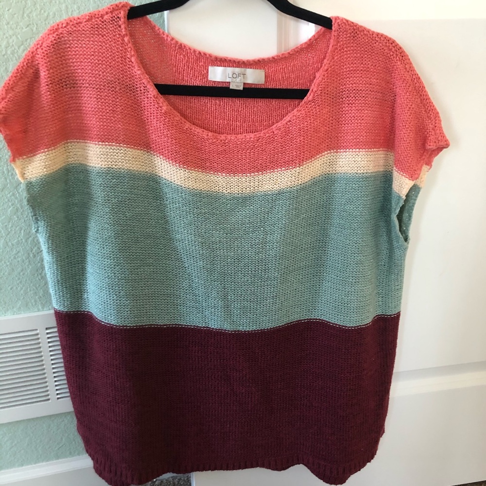 Woman’s sleeveless sweater